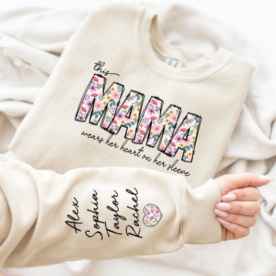 Personalized This Mama Wears Her Heart On Her Sleeve Sweatshirt Floral Mama Sweatshirt with Kids Name on Sleeve Funny Gift for Mom